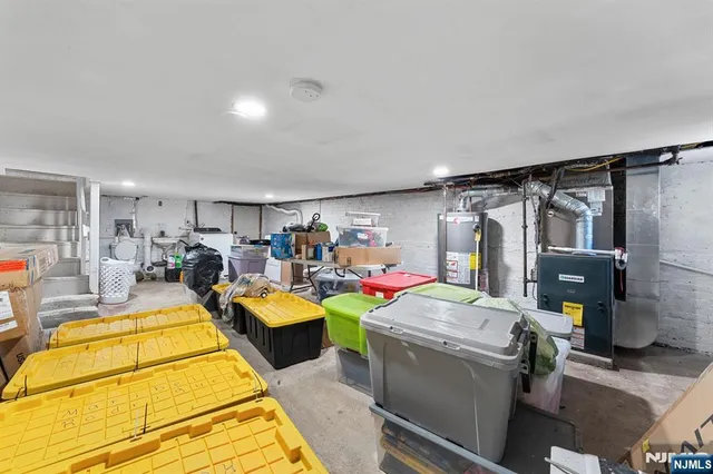 a storage room with washer and dryer