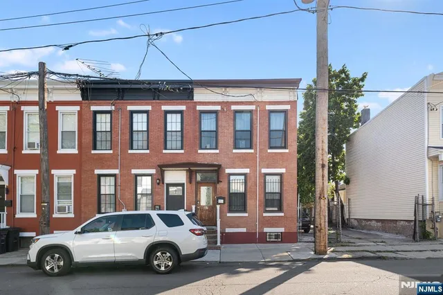 a car parked in front of a building