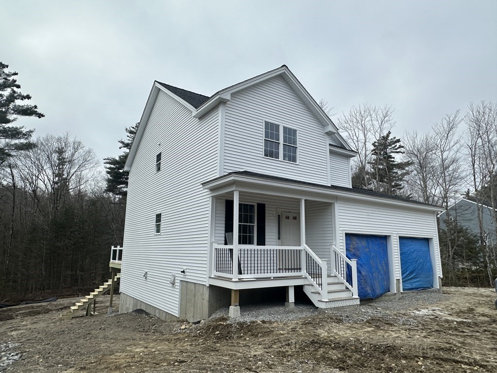 38 Juniper Road Ashburnham, MA 01430 - Photo 1 of 19 a view of a house with a yard