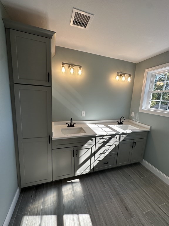 38 Juniper Road Ashburnham, MA 01430 - Photo 19 of 19 a spacious bathroom with a double vanity sink and a mirror