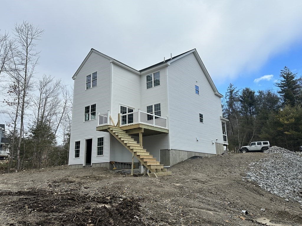 38 Juniper Road Ashburnham, MA 01430 - Photo 3 of 19 a view of a house with backyard