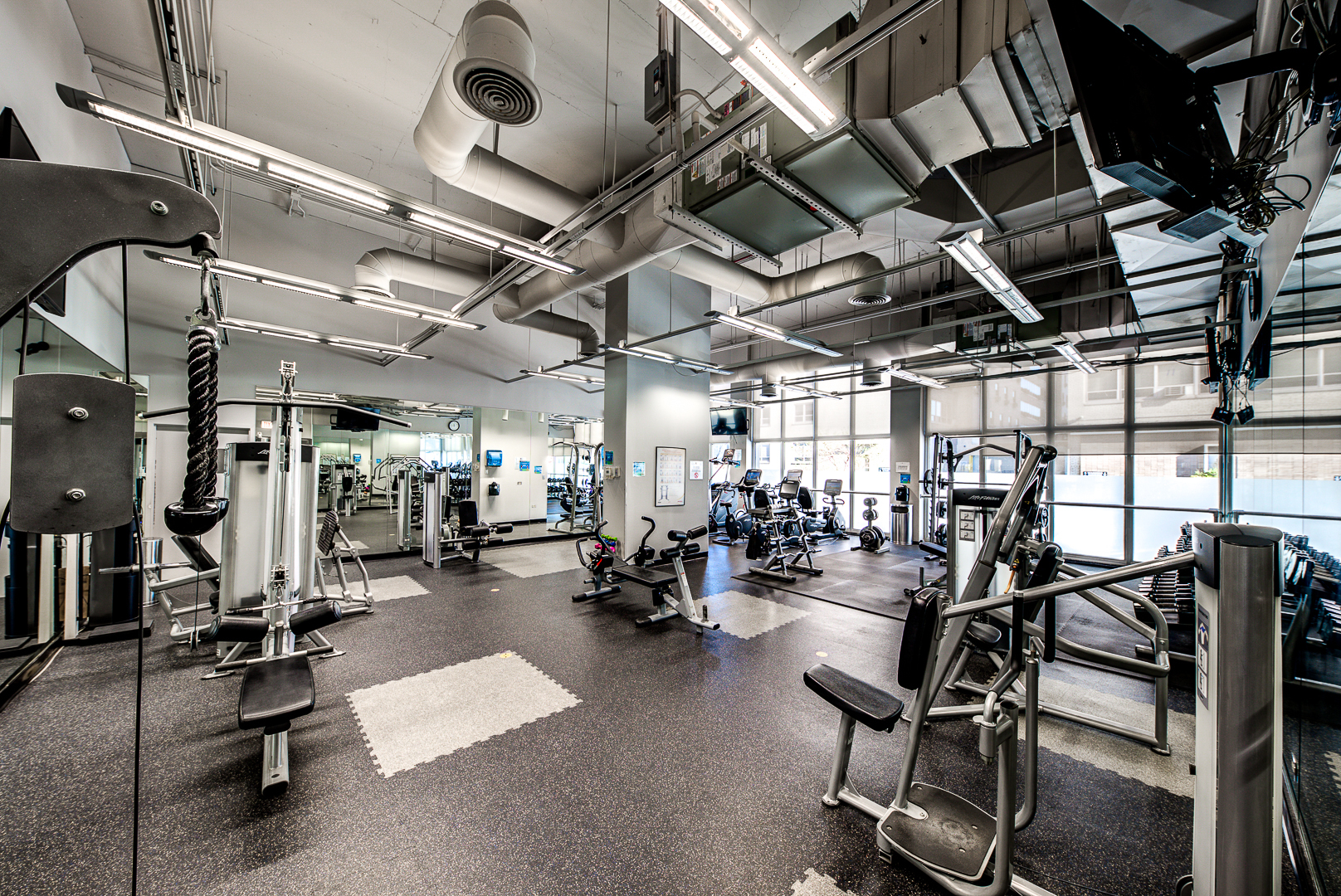 655 West Irving Park Road, Unit 3817 Chicago, IL 60613 - Photo 23 of 28 a view of a room with gym equipment