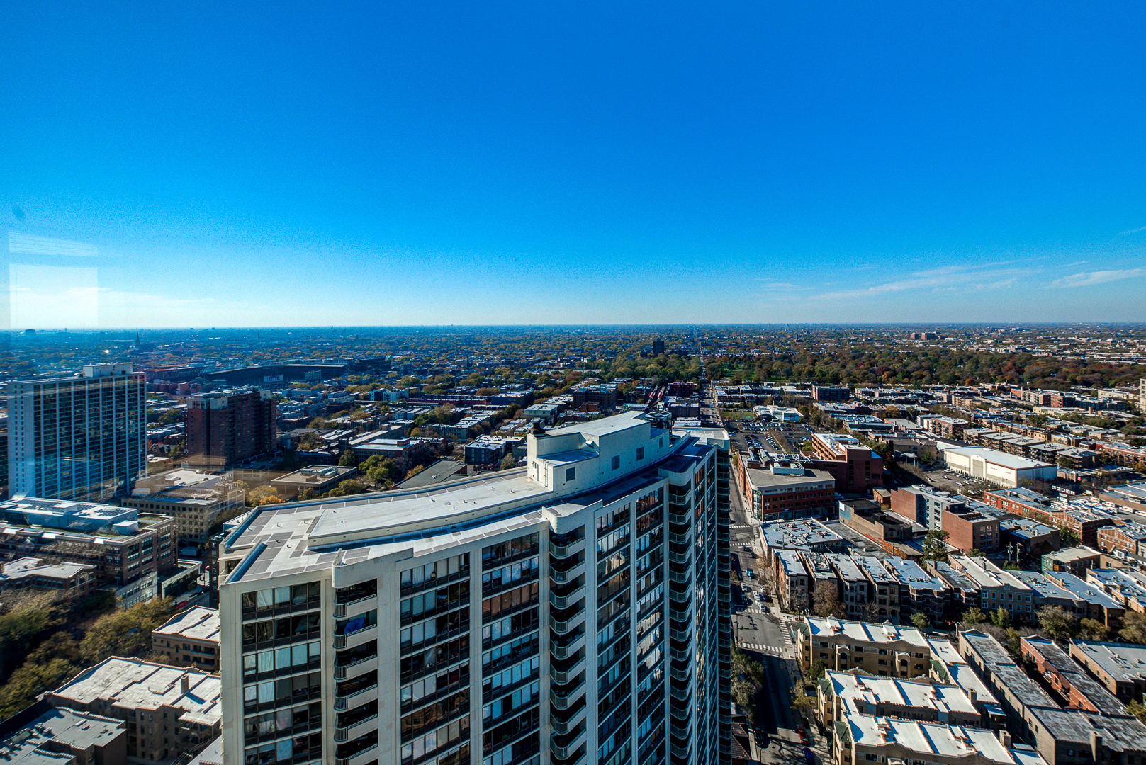 655 West Irving Park Road, Unit 3817 Chicago, IL 60613 - Photo 26 of 28 a city view with tall buildings