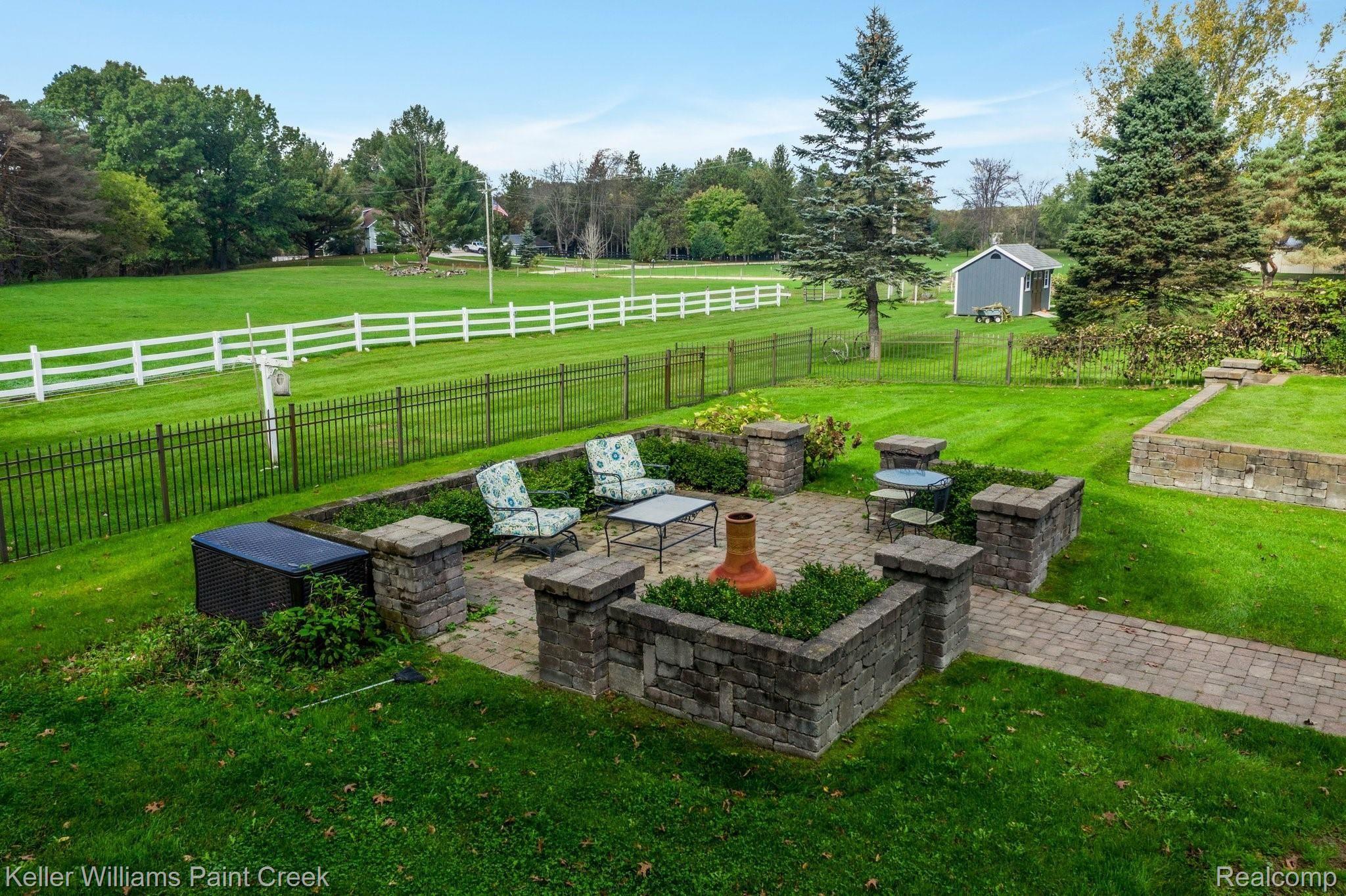 115 Michael Road Lapeer, MI 48446 - Photo 50 of 64 Built for a Home Wedding, this Gorgeous Paver Courtyard is the perfect spot for outdoor entertaining