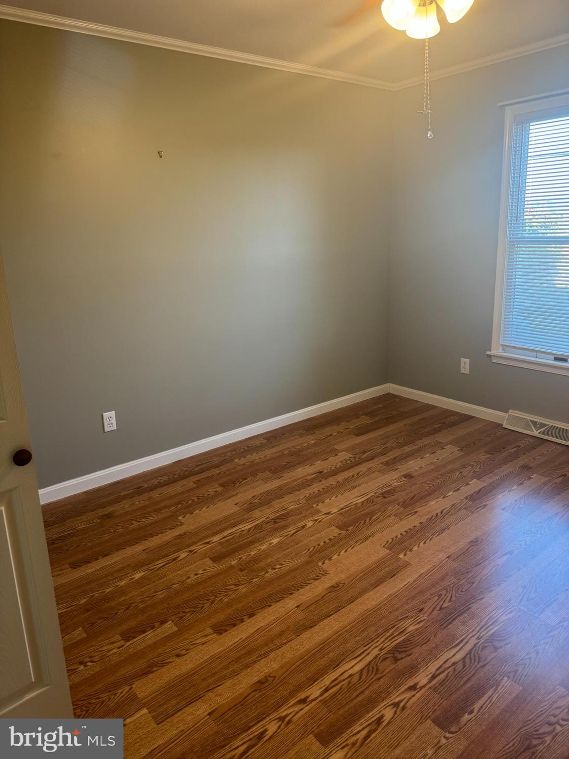 3312 Scotland Road Chambersburg, PA 17202 - Photo 14 of 32 en empty room with wooden floor and fan