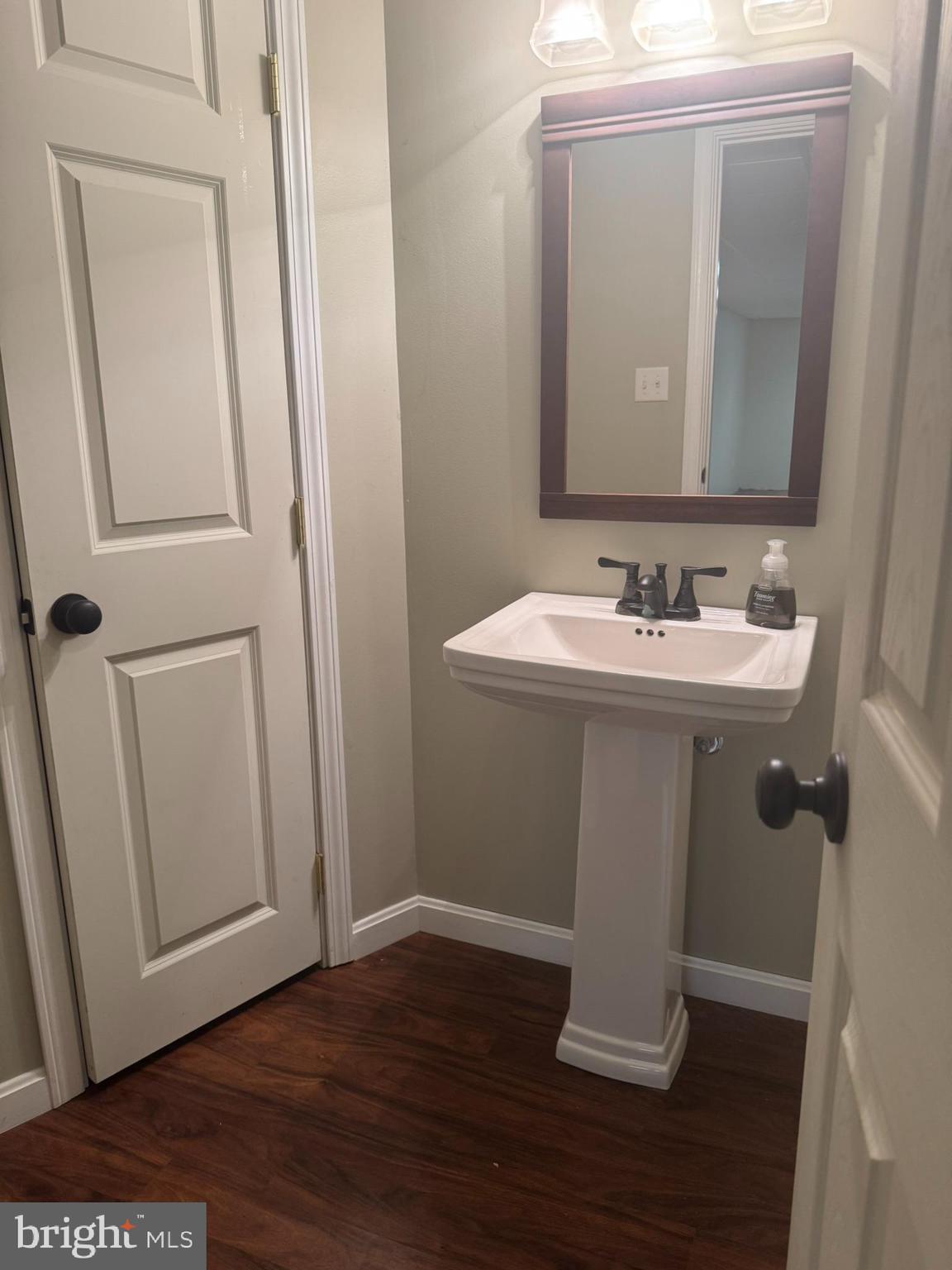 3312 Scotland Road Chambersburg, PA 17202 - Photo 29 of 32 a bathroom with a sink and a mirror