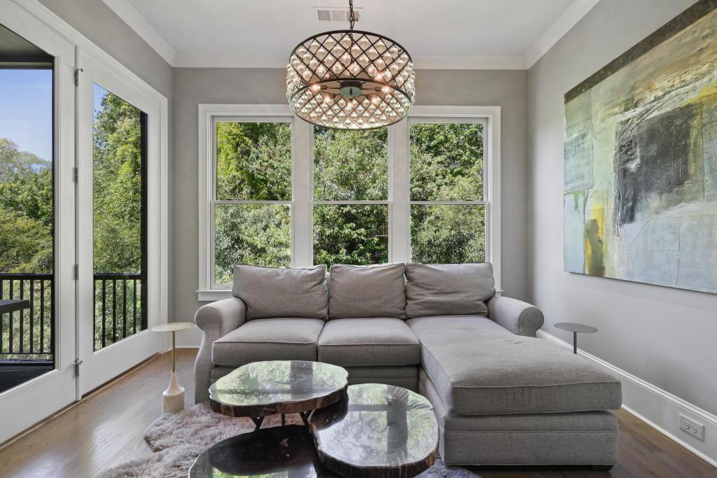 5980 Teton Way Atlanta, GA 30328 - Photo 11 of 48 a living room with furniture and a large window