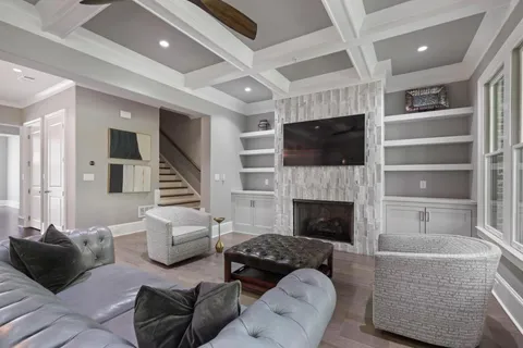 a kitchen with sink a stove and cabinets