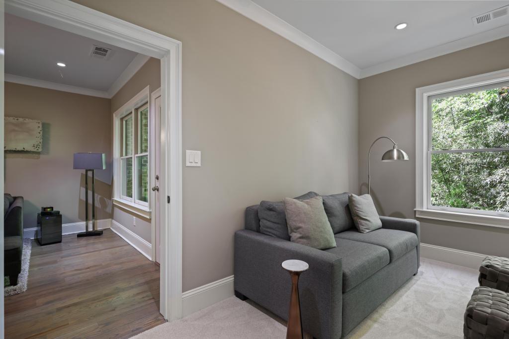 5980 Teton Way Atlanta, GA 30328 - Photo 31 of 48 a living room with furniture and a window