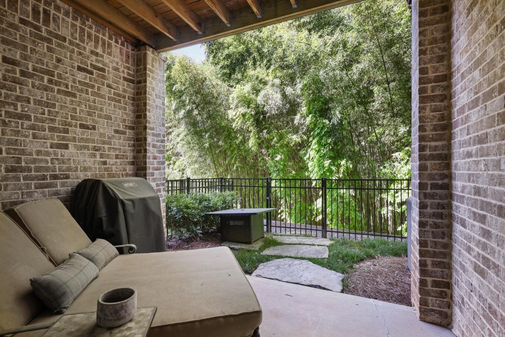 5980 Teton Way Atlanta, GA 30328 - Photo 36 of 48 a view of a balcony with chairs and a potted plant