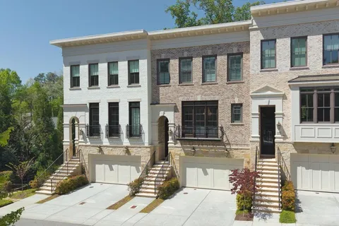 a view of a brick building and a street view