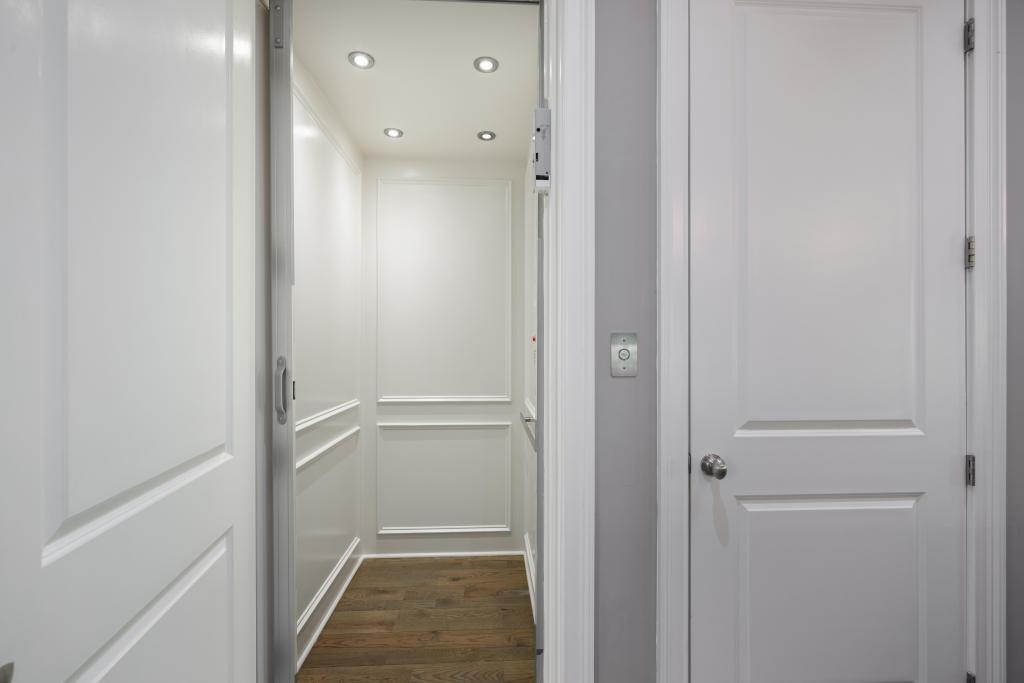 5980 Teton Way Atlanta, GA 30328 - Photo 6 of 48 a view of a hallway with a white walls