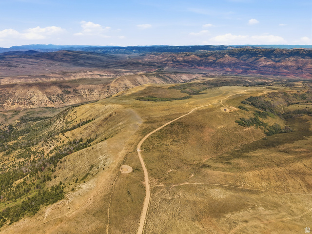 10780 Ford Ridge Road Helper, UT 84526 - Photo 6 of 38 Expansive terrain featuring varied topography, distant mountain ranges, and scattered evergreen trees