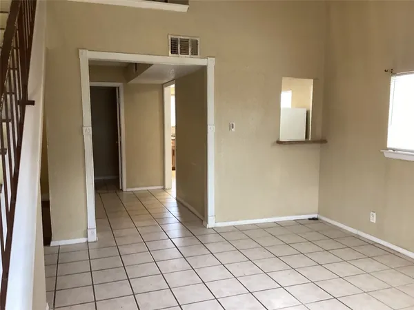 a view of a livingroom with windows