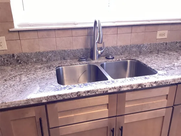 a close view of sink and tap