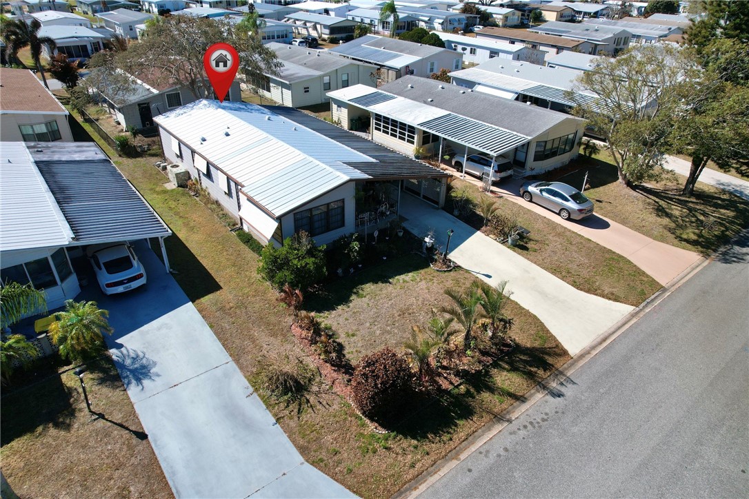 1352 Barefoot Circle Sebastian, FL 32976 - Photo 12 of 29 an aerial view of a house with a yard