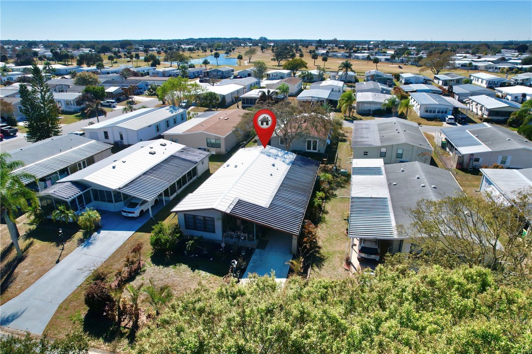 1352 Barefoot Circle Sebastian, FL 32976 - Photo 13 of 29 an aerial view of a house with a yard