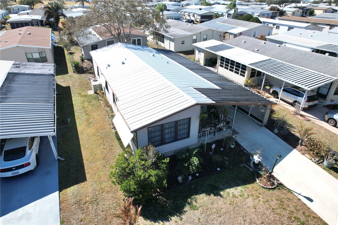1352 Barefoot Circle Sebastian, FL 32976 - Photo 3 of 29 a picture of a house with a yard