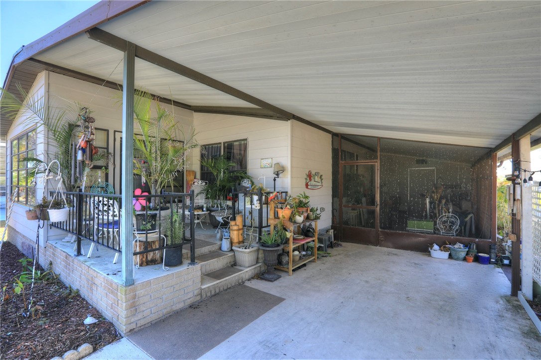 1352 Barefoot Circle Sebastian, FL 32976 - Photo 7 of 29 a view of a room with gym equipment
