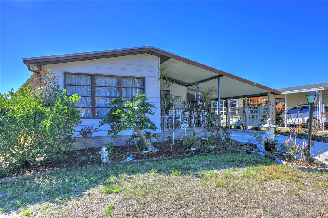 1352 Barefoot Circle Sebastian, FL 32976 - Photo 9 of 29 a view of a house with a yard
