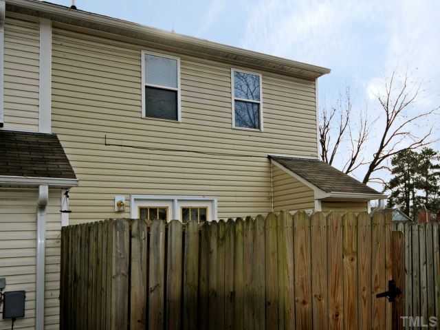 5952 Shady Grove Circle Raleigh, NC 27609 - Photo 6 of 25 a side view of wooden house