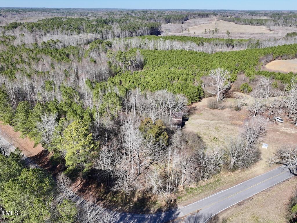1 Savage Road Spring Hope, NC 27882 - Photo 1 of 26 a view of a yard with a plant