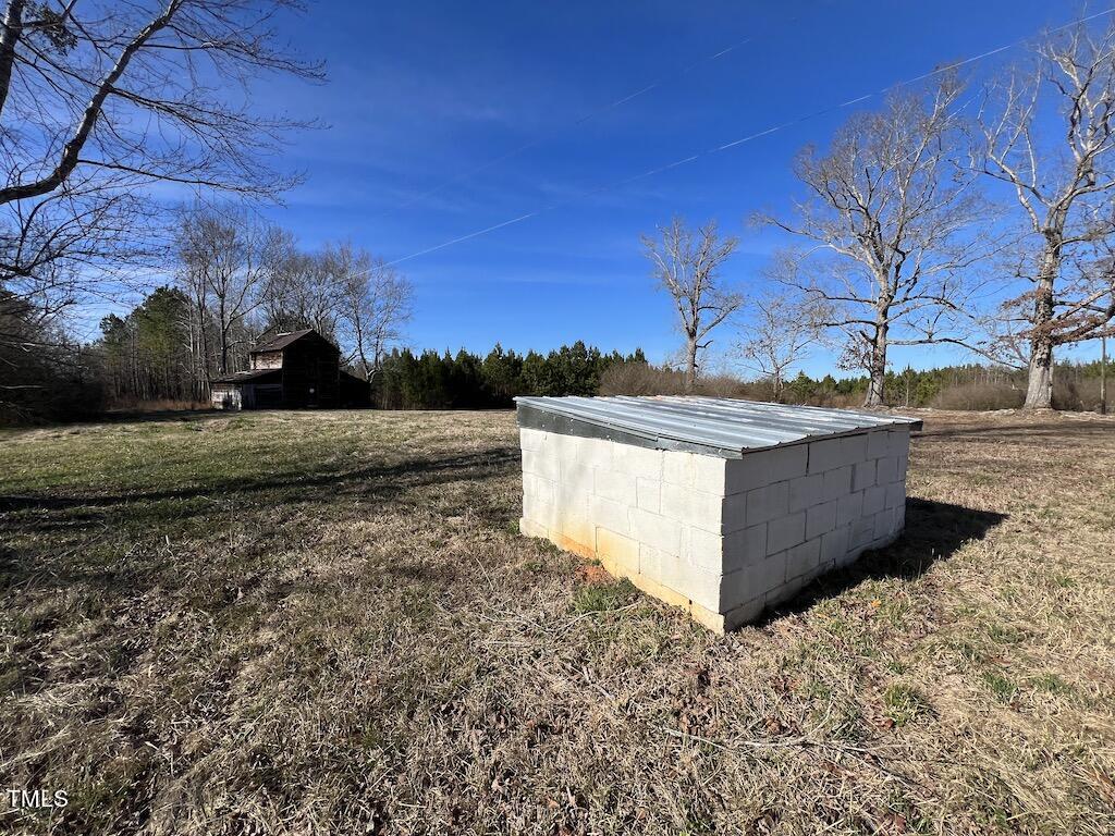 1 Savage Road Spring Hope, NC 27882 - Photo 21 of 26 a view of a dry yard with wooden fence