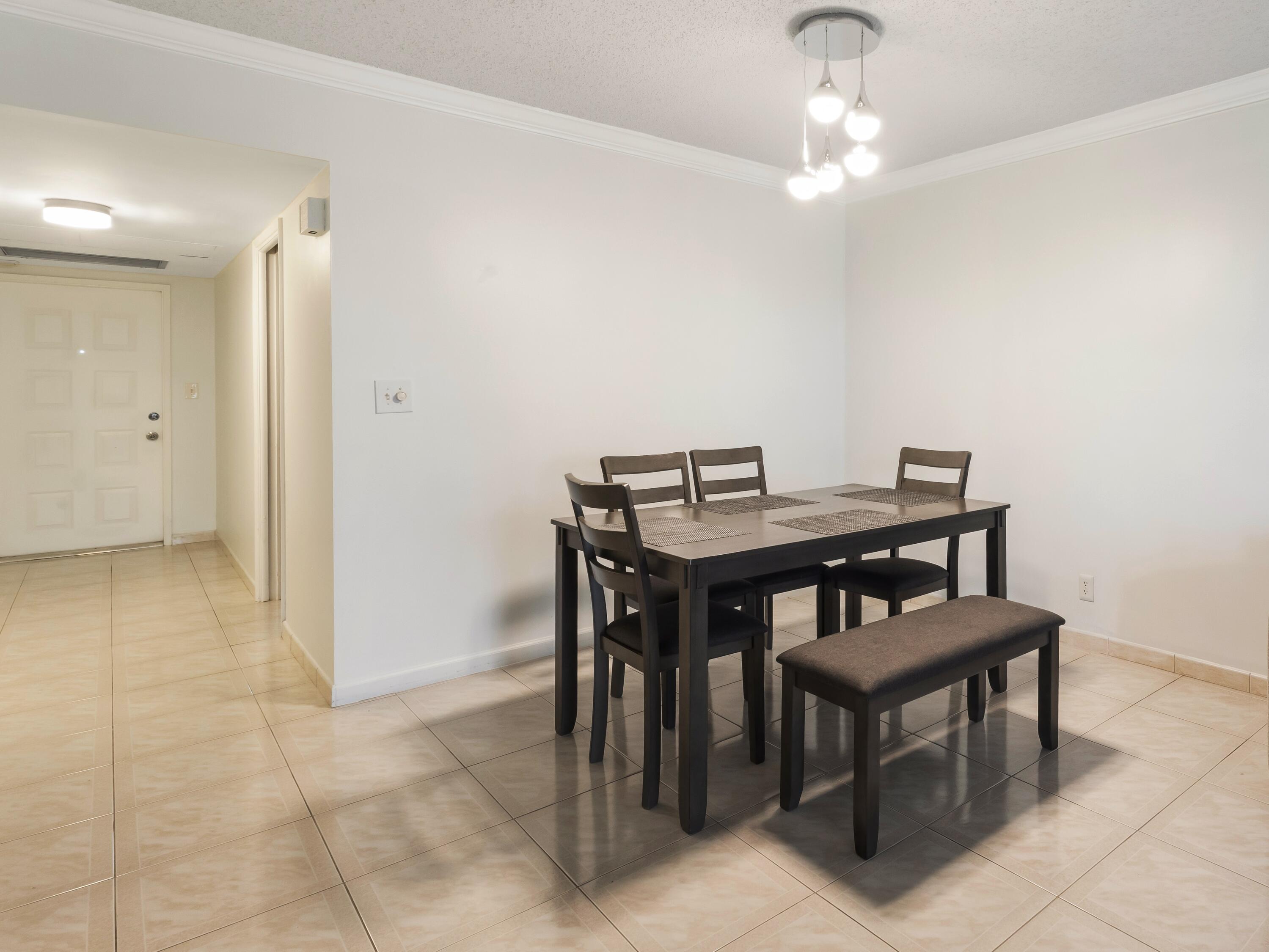 4030 West Palm Aire Drive, Unit 506 Pompano Beach, FL 33069 - Photo 6 of 15 Dining Area
