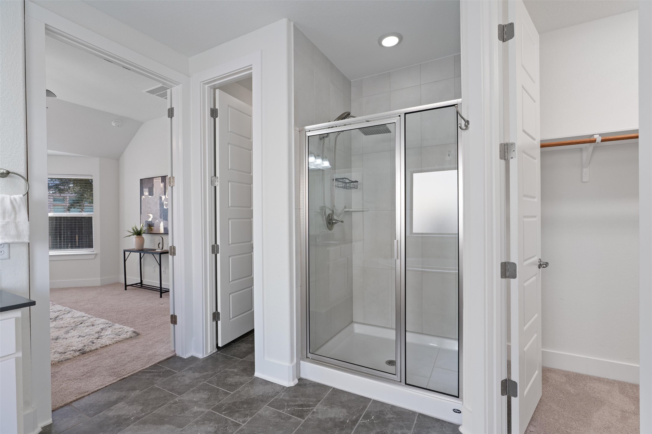 109 Wake Lane Georgetown, TX 78633 - Photo 19 of 34 a bathroom with a glass shower door
