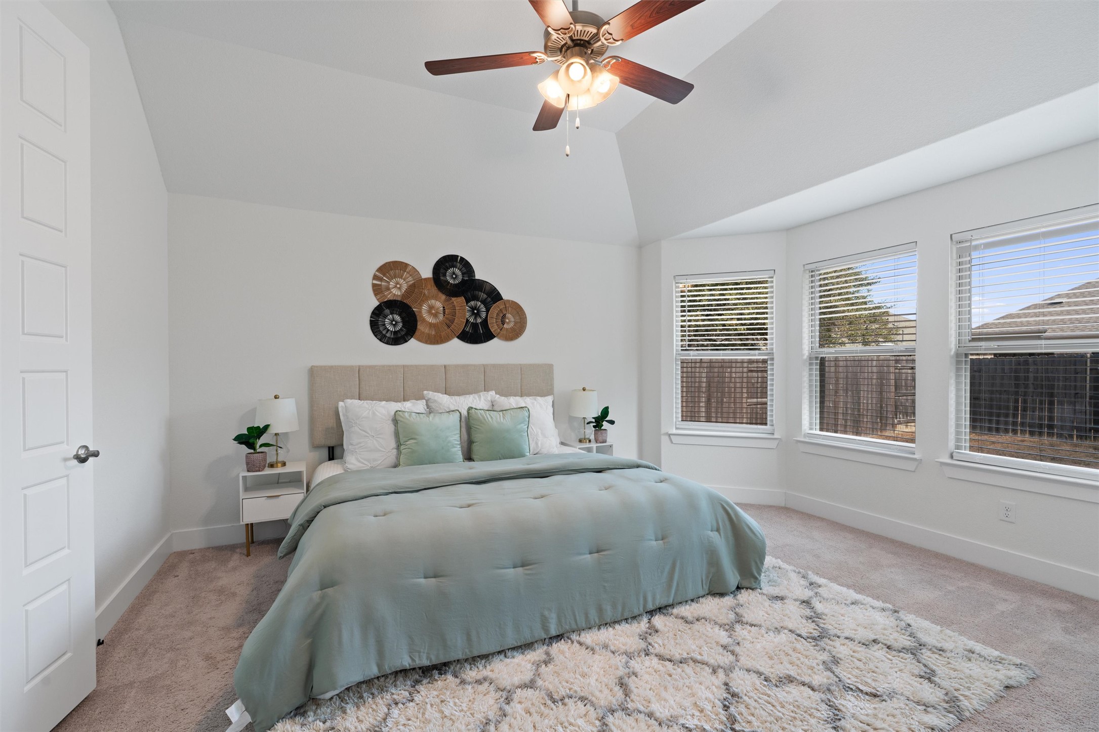 109 Wake Lane Georgetown, TX 78633 - Photo 8 of 34 a bedroom with a bed and a large window