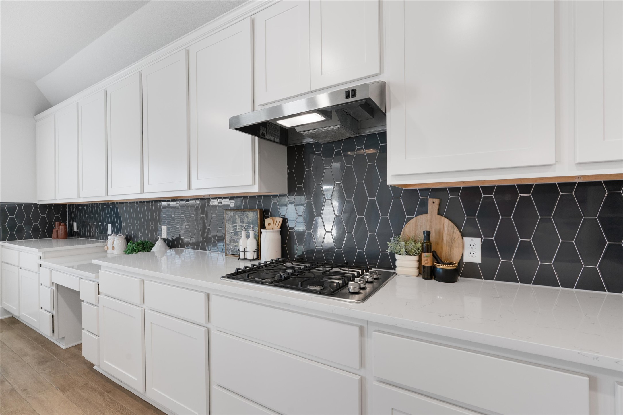 109 Wake Lane Georgetown, TX 78633 - Photo 10 of 34 a kitchen with a sink and cabinets