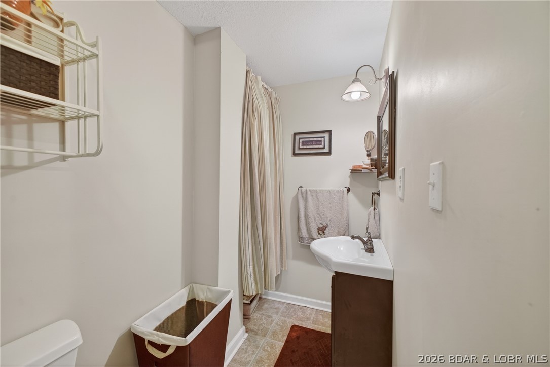 1359 Lick Creek Road Edwards, MO 65326 - Photo 32 of 67 Lower level bathroom (plumbed for shower)