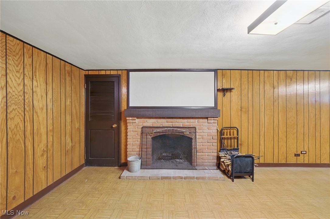 531 Ransome Road Cleveland, OH 44143 - Photo 20 of 27 Full basement has recreation room with wet bar, laundry room, work area and tons of storage. 2-car attached garage with new garage door opener in 06/24.