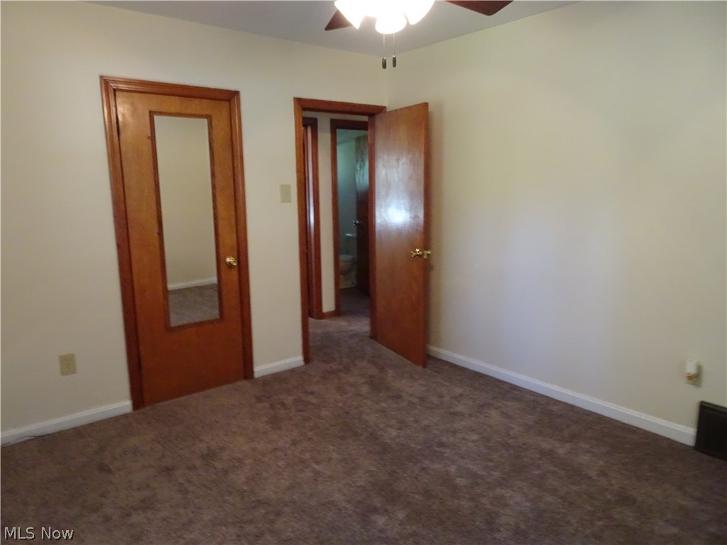 3265 Cottage Grove Road Akron, OH 44319 - Photo 8 of 21 Master bedroom with lighted closet