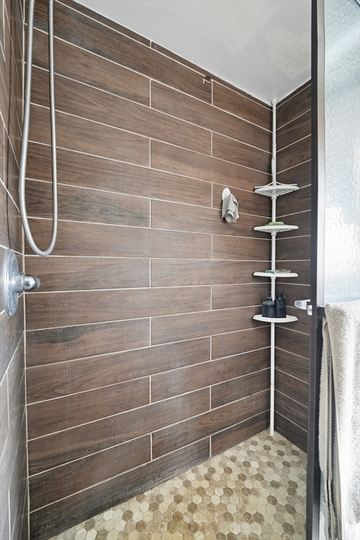 145 Amostown Road West Springfield, MA 01089 - Photo 8 of 26 a bathroom with a shower