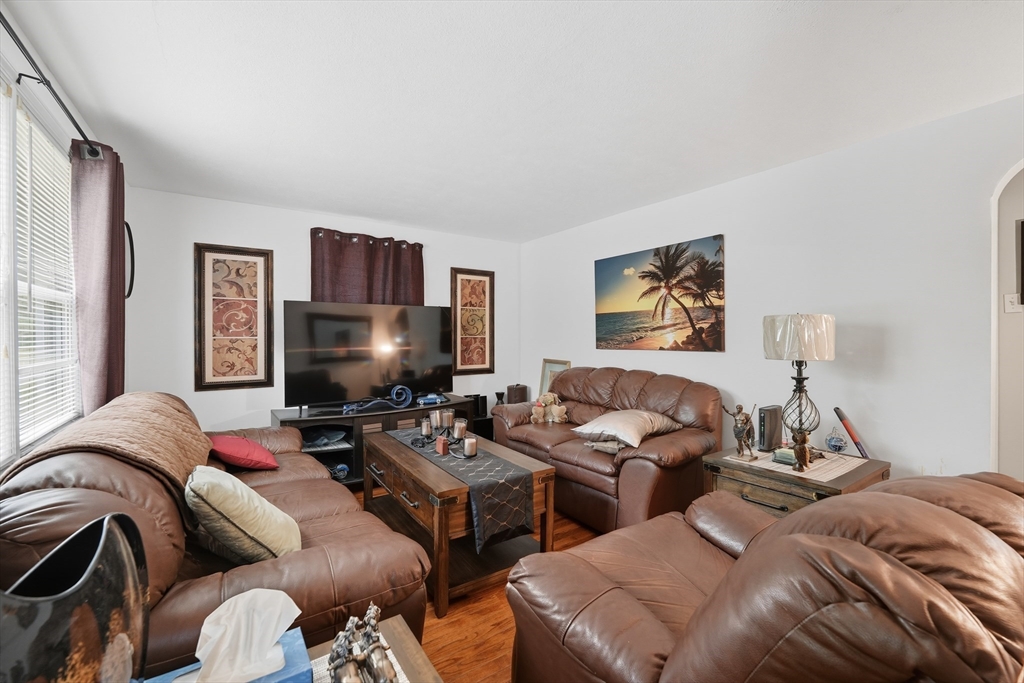 145 Amostown Road West Springfield, MA 01089 - Photo 9 of 26 a living room with furniture kitchen view and a window