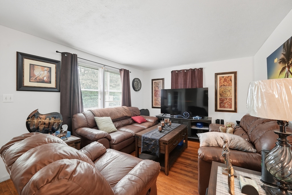 145 Amostown Road West Springfield, MA 01089 - Photo 10 of 26 a living room with furniture and a window