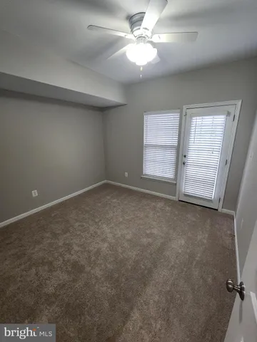a view of a house with a yard and garage