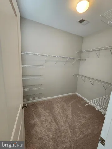 a bathroom with a bathtub and a sink