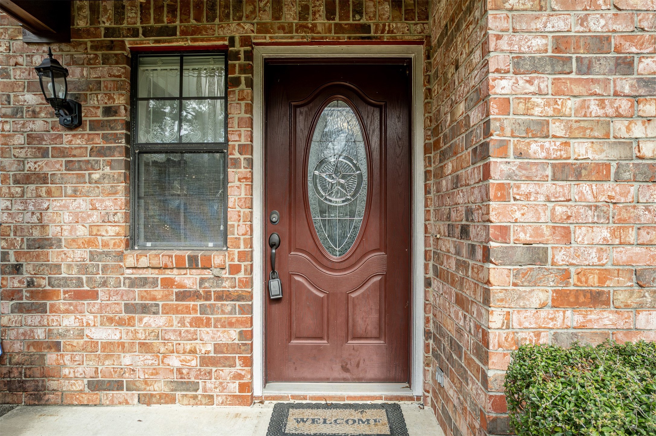 329 Burwell Road Highlands, TX 77562 - Photo 12 of 44 a front view of a house with a garden