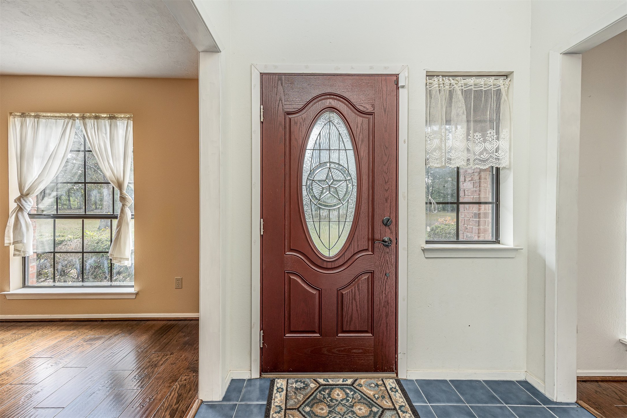 329 Burwell Road Highlands, TX 77562 - Photo 13 of 44 a front view of a house with garden