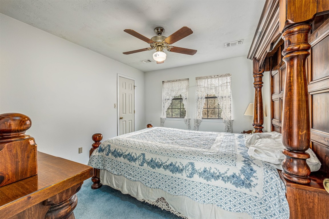 329 Burwell Road Highlands, TX 77562 - Photo 29 of 44 a bedroom with a bed and a window