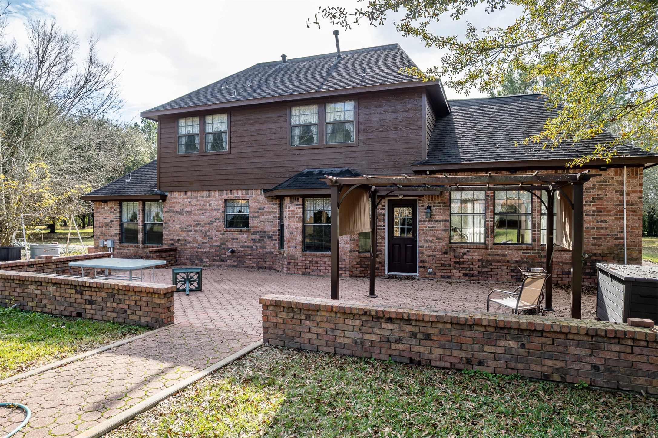 329 Burwell Road Highlands, TX 77562 - Photo 32 of 44 a front view of a house with porch