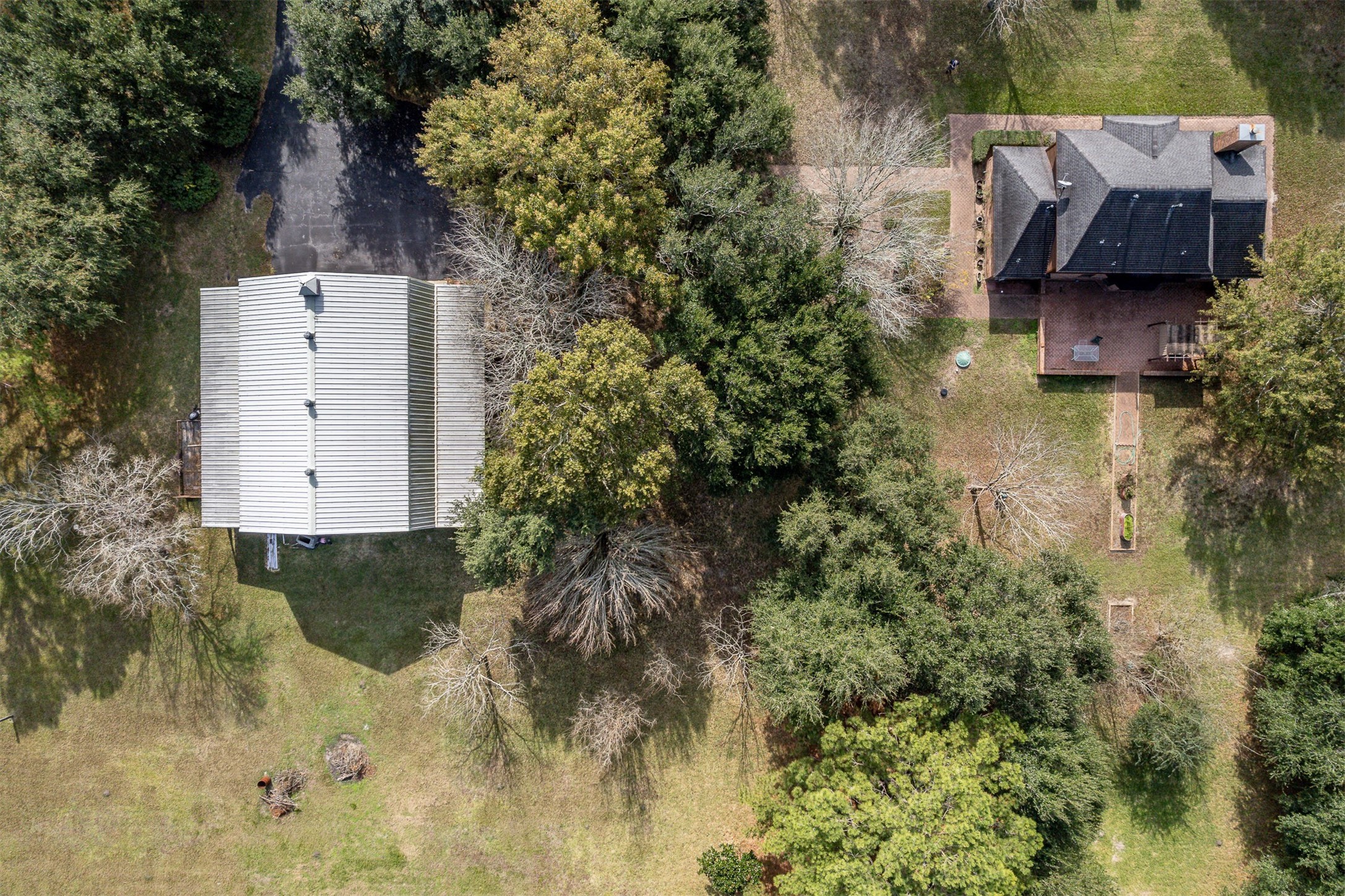 329 Burwell Road Highlands, TX 77562 - Photo 39 of 44 an aerial view of a house with a yard