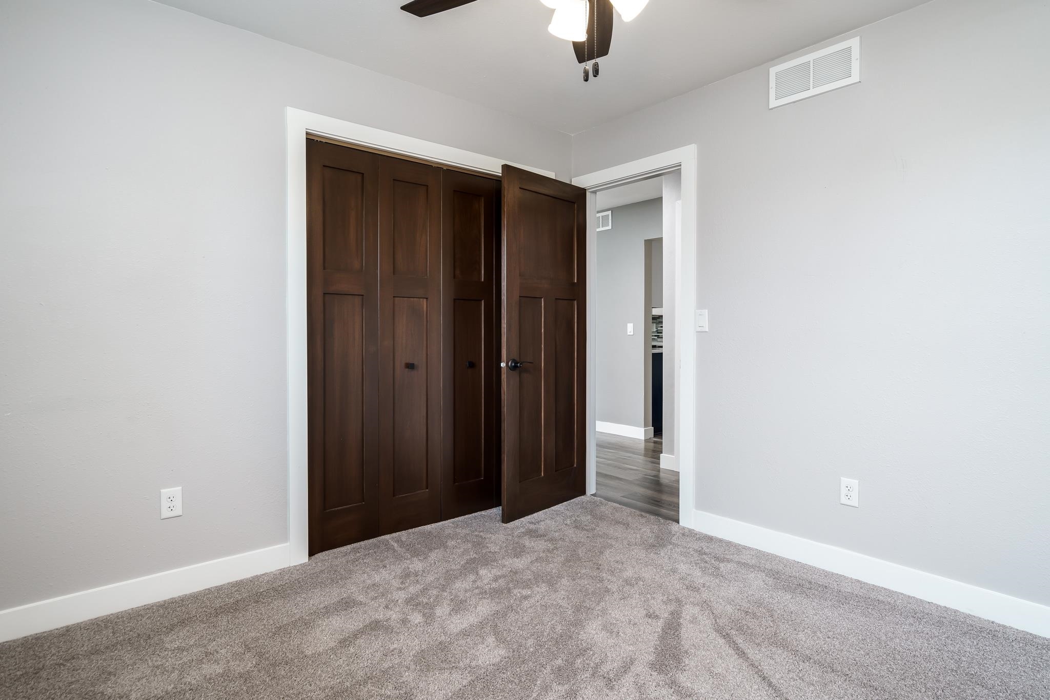 6780 Manchester Road South Beloit, IL 61080 - Photo 29 of 44 an empty room with a empty space and a ceiling fan