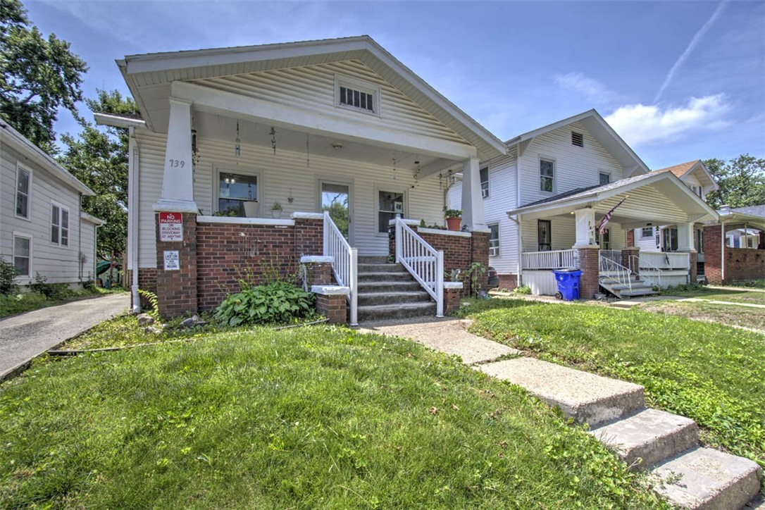 739 West Cushing Street Decatur, IL 62526 - Photo 6 of 28 a front view of house with yard and outdoor seating