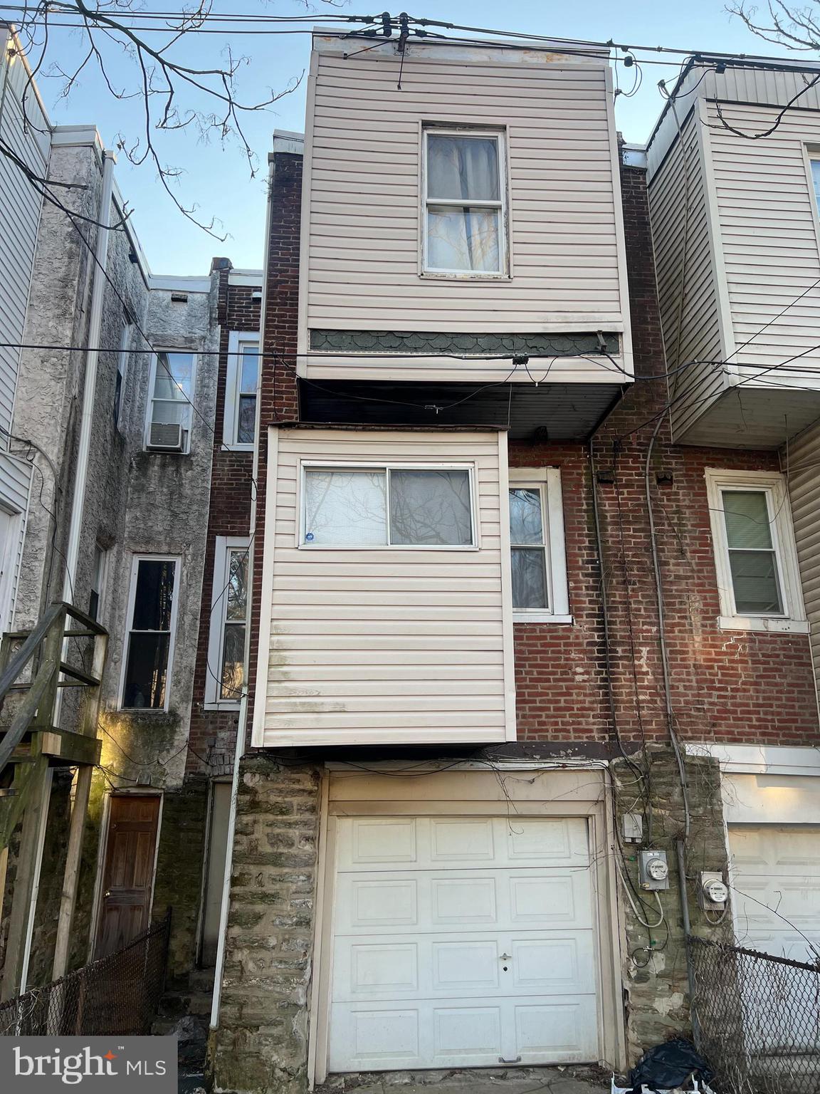 6925 Forrest Avenue Philadelphia, PA 19138 - Photo 12 of 12 a view of a house with a door