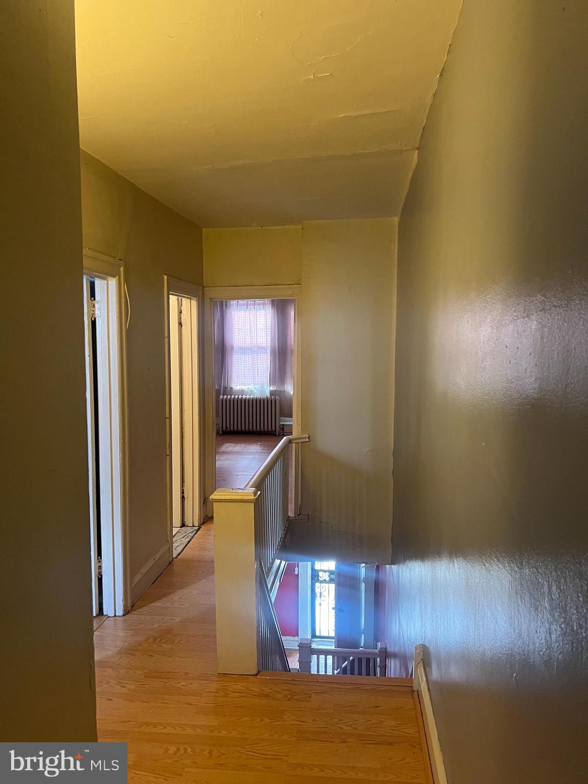 6925 Forrest Avenue Philadelphia, PA 19138 - Photo 8 of 12 a living room with furniture and a flat screen tv