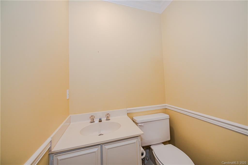 834 Cherokee Road Charlotte, NC 28207 - Photo 16 of 22 a bathroom with a sink and a toilet