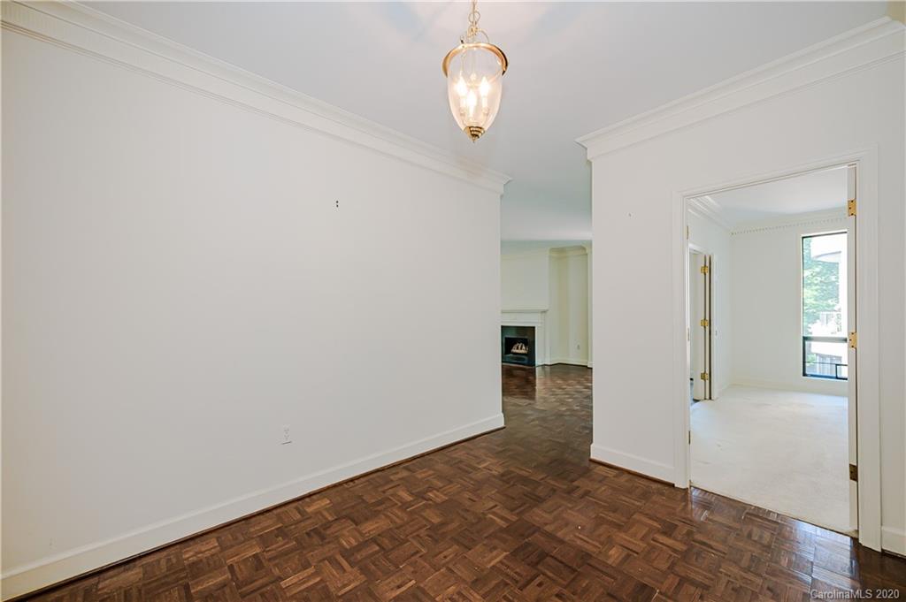 834 Cherokee Road Charlotte, NC 28207 - Photo 3 of 22 wooden floor in an empty room